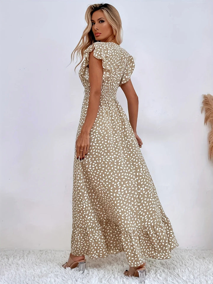 Elegant women's flora print midi dress with flattering ruffles, ideal for special occasions.