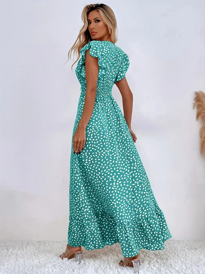 Trendy women's floral midi dress, a vibrant flora print and stylish ruffles for summer.