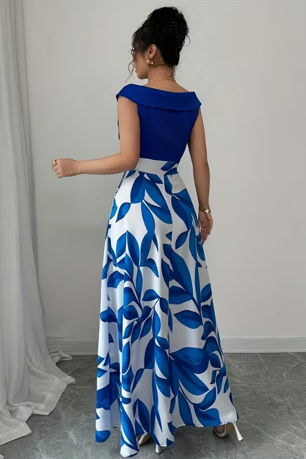 Women's V-neck A-line maxi dress featuring a vibrant floral pattern and essential side pockets.