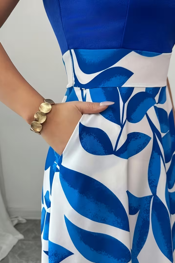 Chic women's elegant floral maxi A-line dress with V-neck & pockets, ideal for summer & casual wear.
