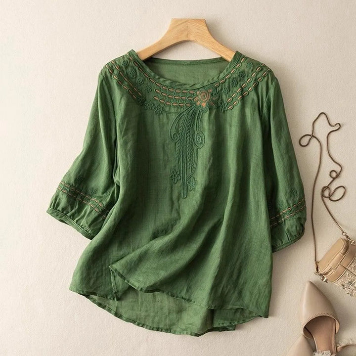 Women's versatile floral bloom print blouse. Elegant relaxed fit top suitable for spring & summer wear.