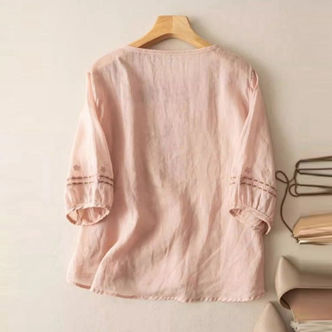 Beautiful women's floral bloom blouse, featuring an elegant bloom print & comfortable relaxed fit for summer.