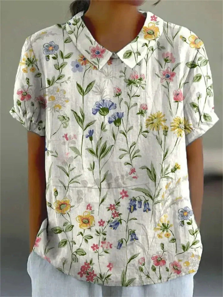 Comfortable women's floral long sleeve blouse, a versatile fashion top for casual or elegant wear.