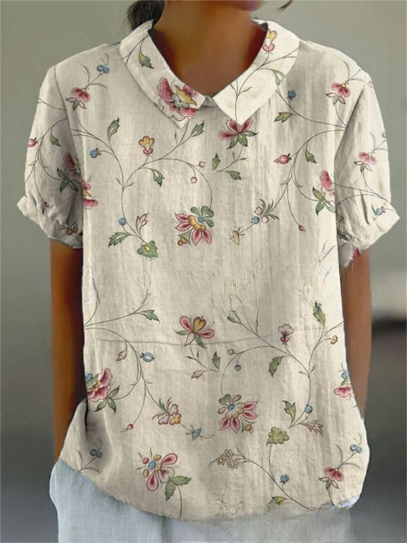 Stylish women's printed floral blouse, long sleeve fashion top, ideal for spring and summer outfits.