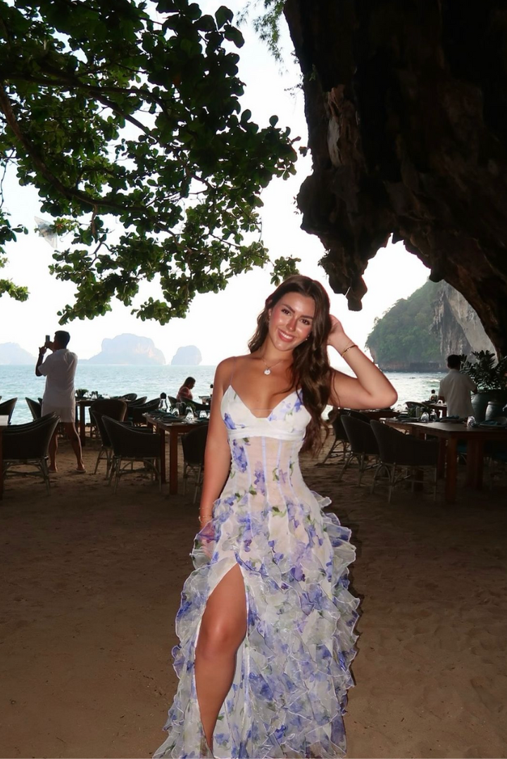 Full-length image of a women's floral corset ruffle maxi dress, ideal for any formal celebration.