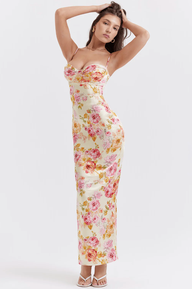 Beautiful floral print maxi dress for women, featuring a flattering slip style & elegant corset detail. Wedding guest.