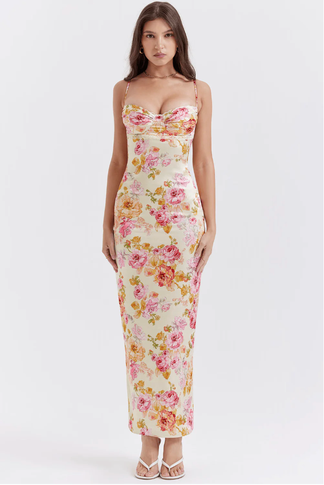Chic sleeveless floral maxi dress, a comfortable slip & corset design, perfect for elegant wedding guest attire.