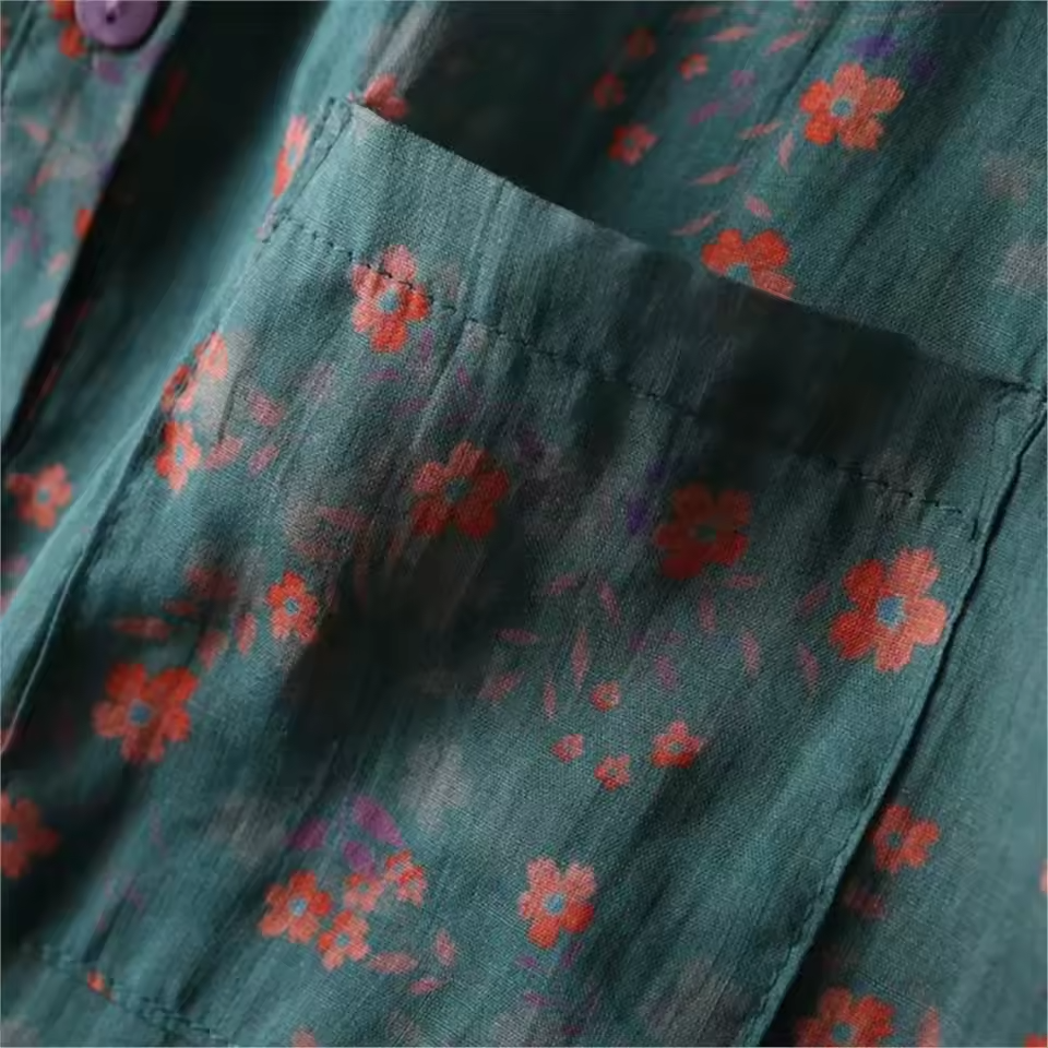 Versatile women's floral print button-down shirt with a half placket, ideal for casual and elegant outfits.