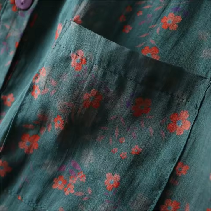 Versatile women's floral print button-down shirt with a half placket, ideal for casual and elegant outfits.