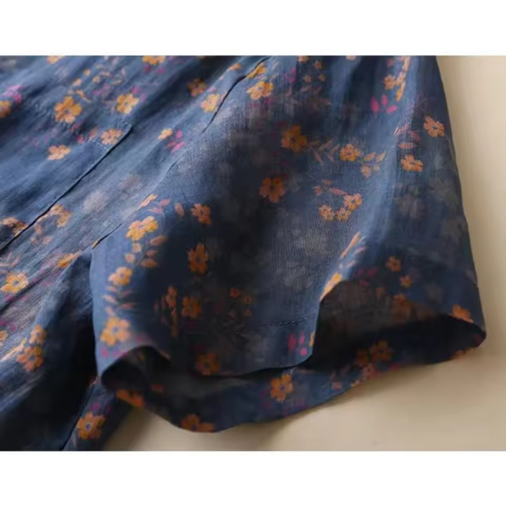 Beautiful women's floral half-placket button shirt, a relaxed fit blouse for spring & summer elegance.