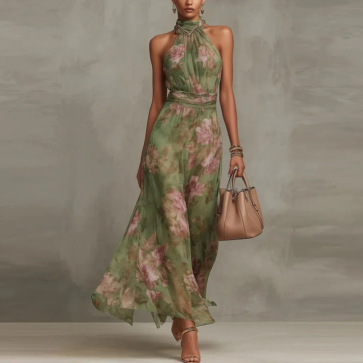 Flowy floral print halter neck maxi dress for women, ideal elegant vacation or party attire.