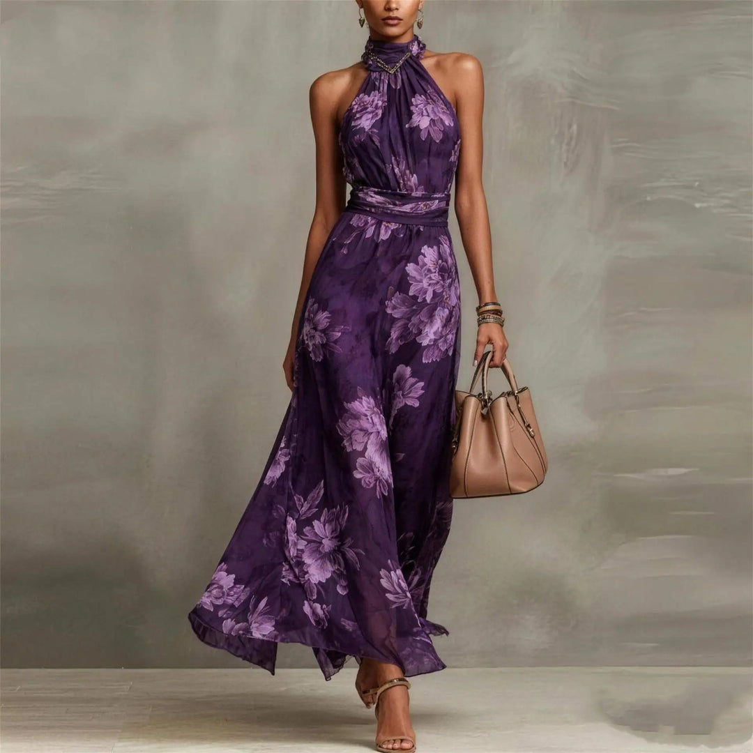 Women's elegant floral print halter maxi dress, perfect as a wedding guest or vacation party outfit.