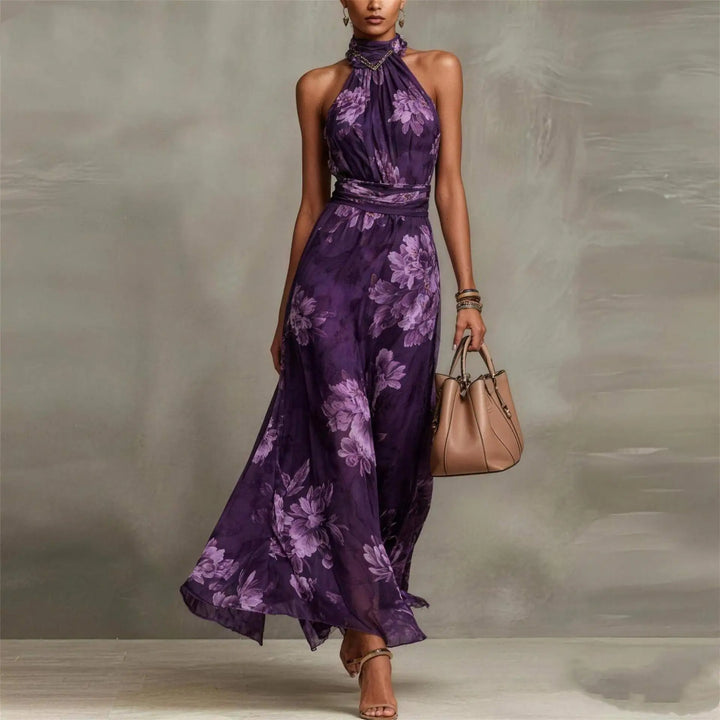 Women's elegant floral print halter maxi dress, perfect as a wedding guest or vacation party outfit.
