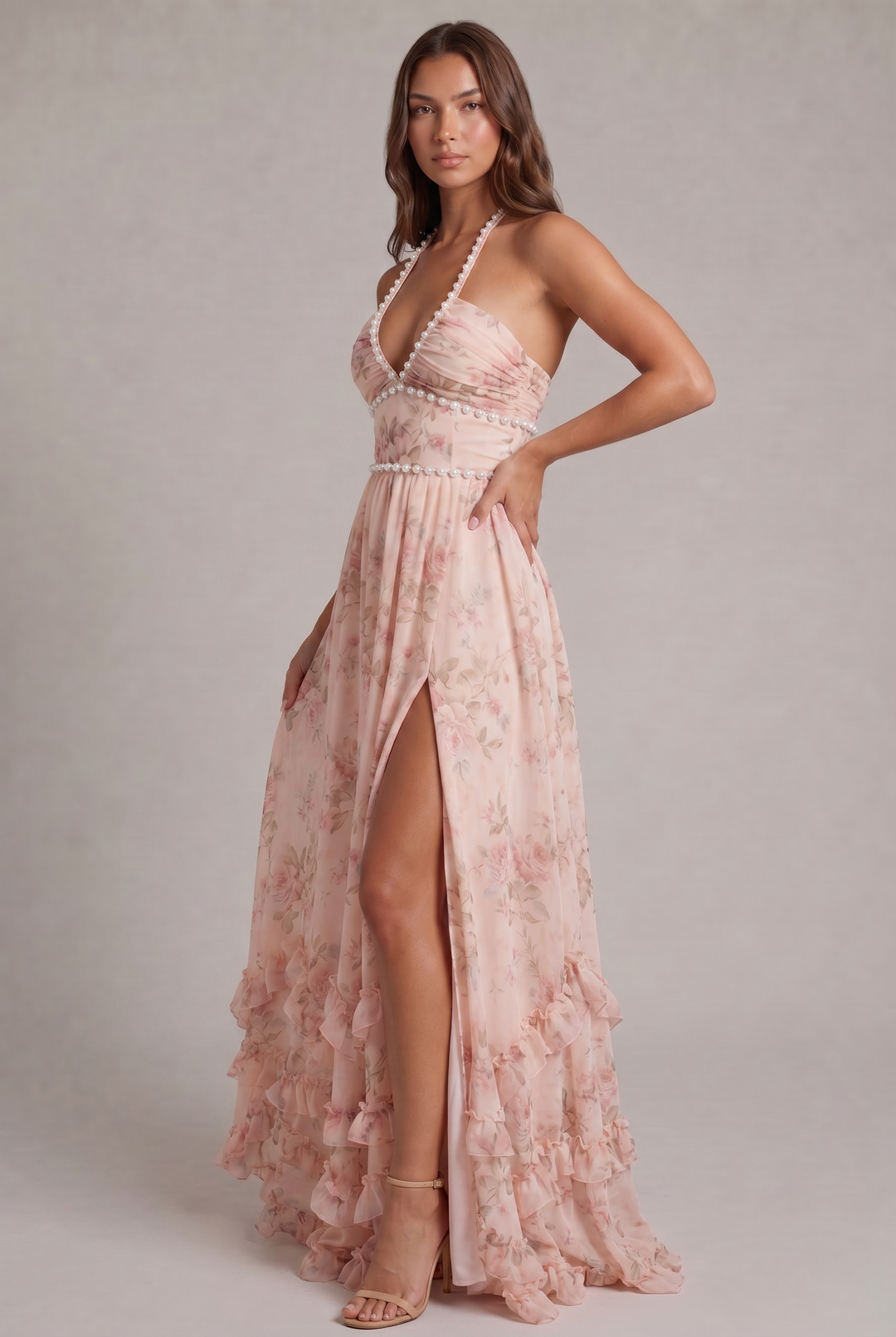 Flowy women's floral maxi dress with ruffle halter neck, ideal for weddings or evening events.