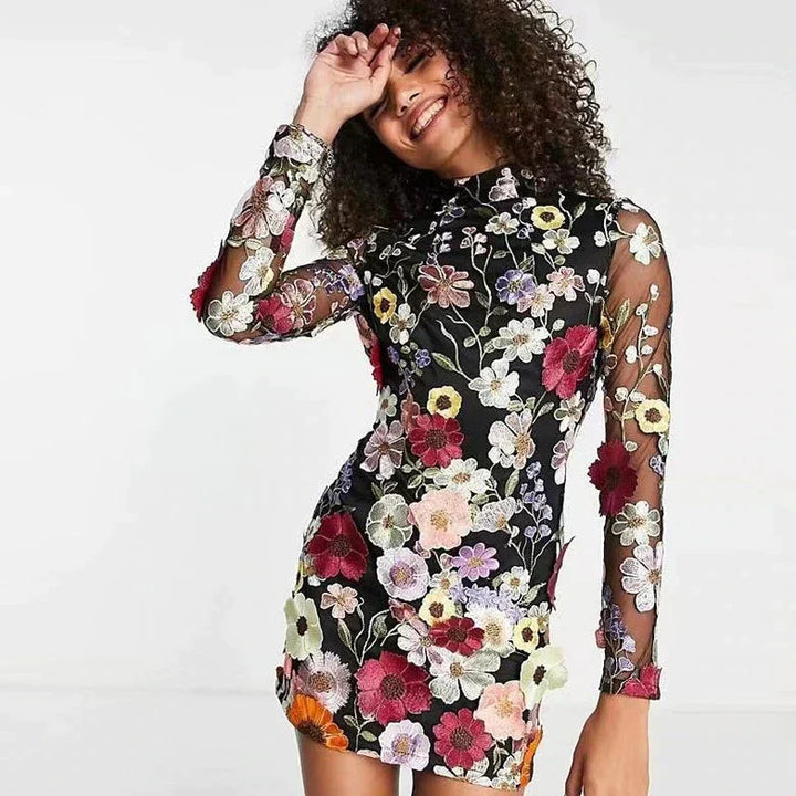 Chic women's high neck, long sleeve floral lace cocktail dress. Elegant party wear for any special event.