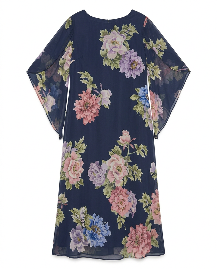 Woman confidently walking in a versatile elegant floral maxi dress, showcasing its flowing silhouette for effortless style.