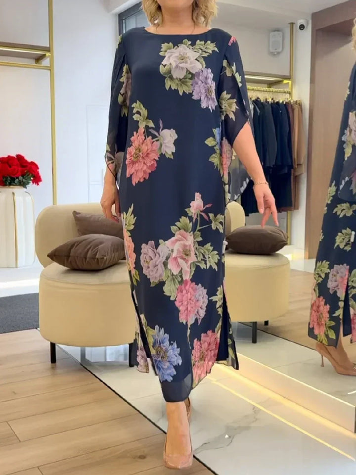 Chic women's long floral maxi dress, perfect for special occasions or casual summer wear. Features a comfortable, elegant design.