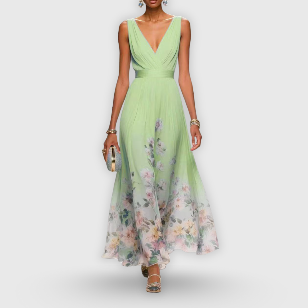Flowing women's floral print V-neck maxi dress, an elegant sleeveless A-line gown for garden party fashion.