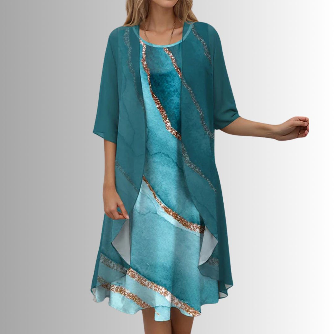 Women's two-piece floral midi dress & cardigan set, ideal for a stylish vacation outfit or spring travel.