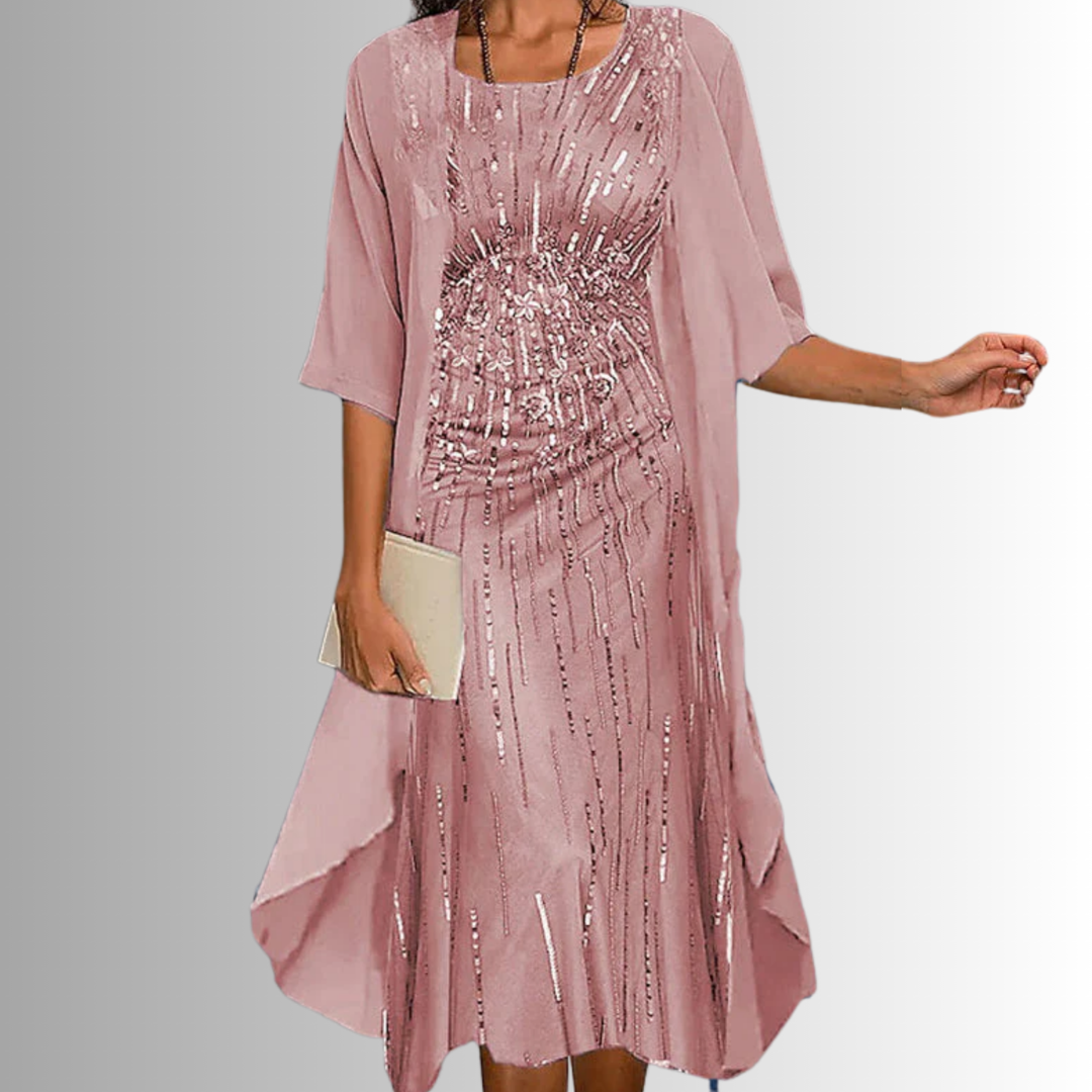 Chic women's floral midi dress paired with a light cardigan, a fashionable two-piece set for spring & summer.