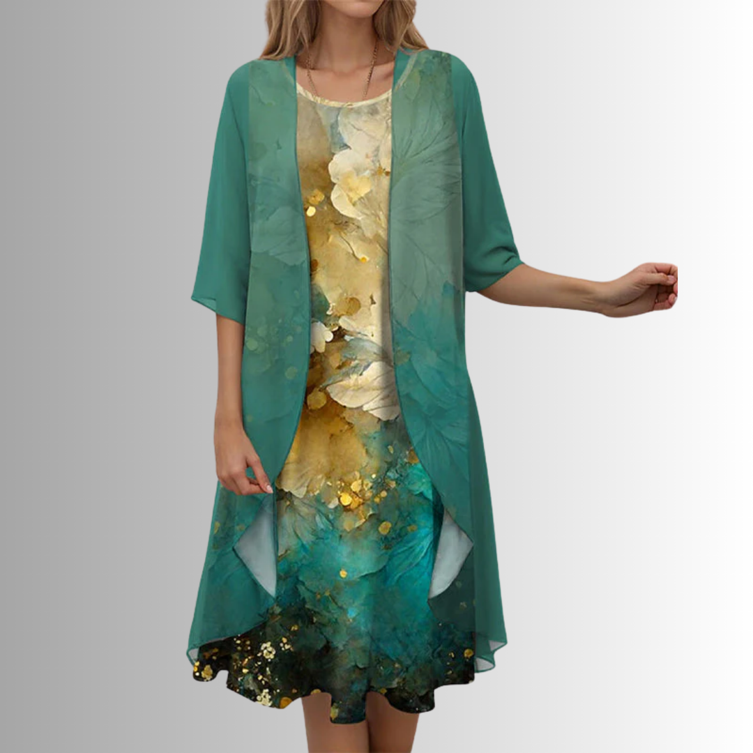 Complete women's floral midi dress and cardigan outfit set, offering an elegant & comfortable coordinated look.