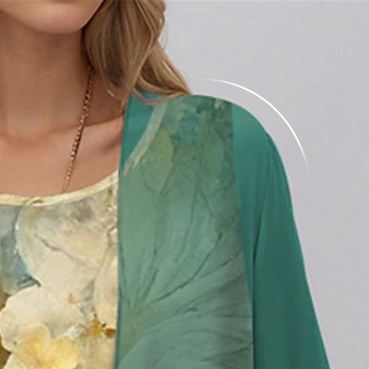 Beautiful women's floral midi dress and cardigan set, an elegant two-piece perfect for parties or events.