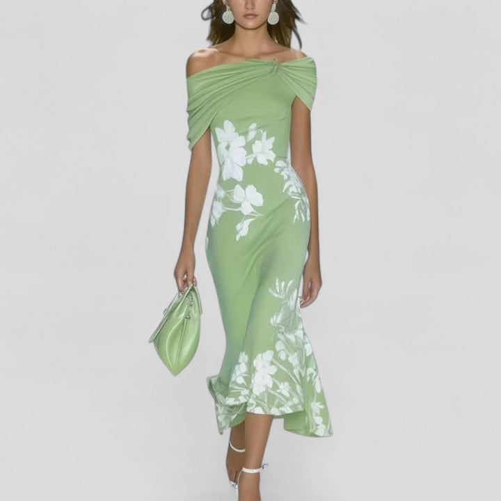 Elegant women's floral midi dress, perfect for special occasions. Features a graceful flared skirt and vibrant print.
