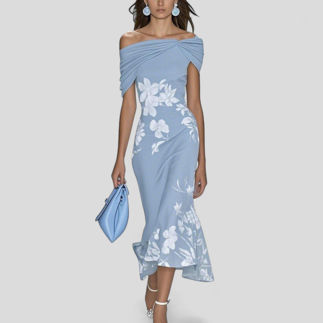 Stylish women's midi party dress with a beautiful floral print. Ideal for summer events & elegant occasions.