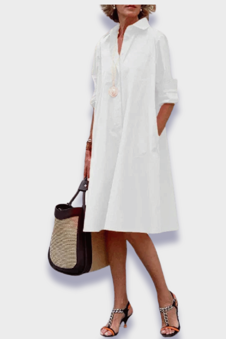 Flattering women's floral midi dress with defined waist, suitable for elegant spring fashion & events.