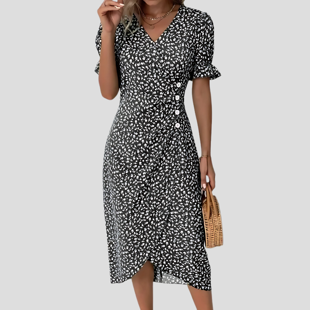 Flowy floral midi dress for women, ideal for casual summer outings or elegant party wear. Button-front design.