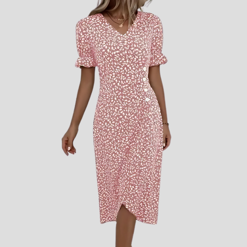 Feminine v-neck floral midi dress with short sleeves and full button front. Versatile for casual or elegant events.
