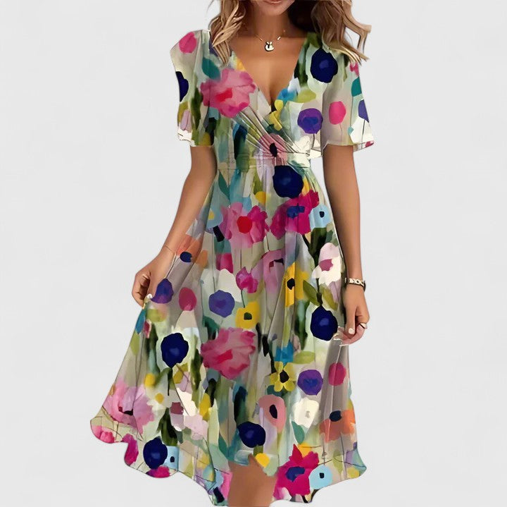 Chic V-neck floral midi dress for women, featuring stylish flutter sleeves. Ideal for spring fashion.