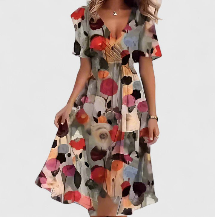 Beautiful women's floral midi dress with delicate flutter sleeves & V-neck, ideal for elegant events.