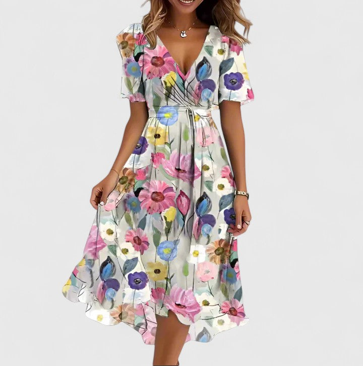 Spring/Summer women's floral midi dress with flowy flutter sleeves and a flattering V-neck design.