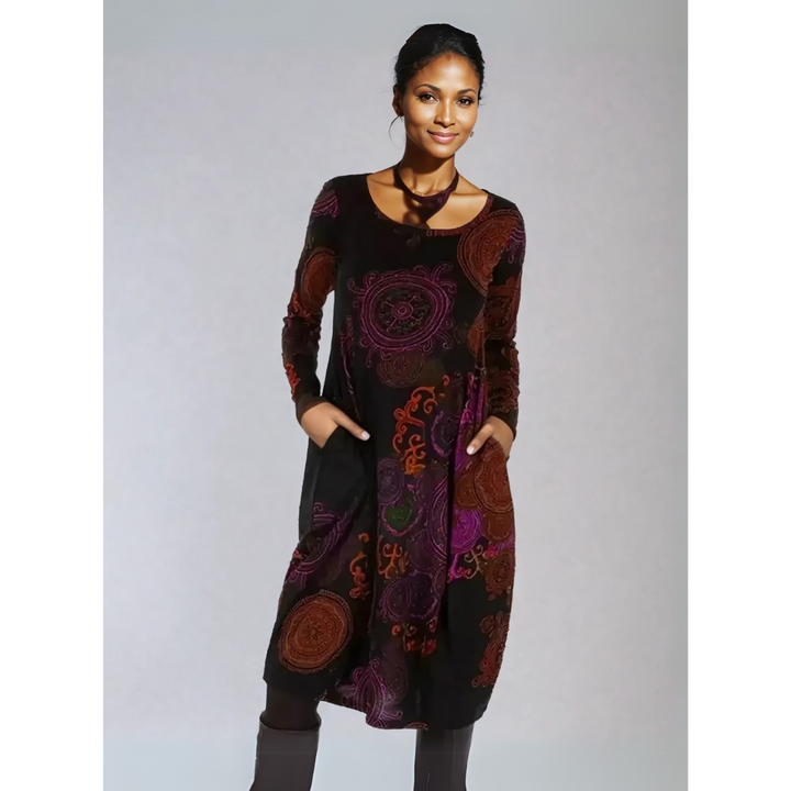 Chic women's midi dress with long sleeves and delicate floral pattern, a key fall fashion item.