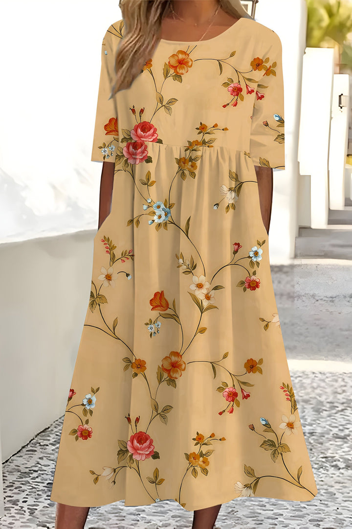 Elegant women's floral midi wrap dress, perfect for spring/summer. Versatile day-to-evening style with a flattering fit.