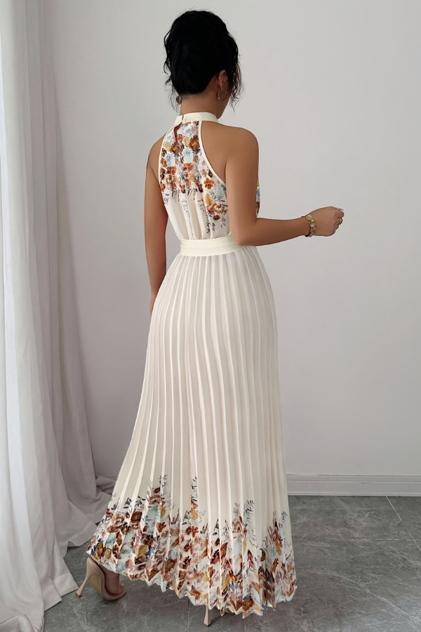 Stylish square neck floral pleated midi dress, perfect for an elegant evening or party occasion.