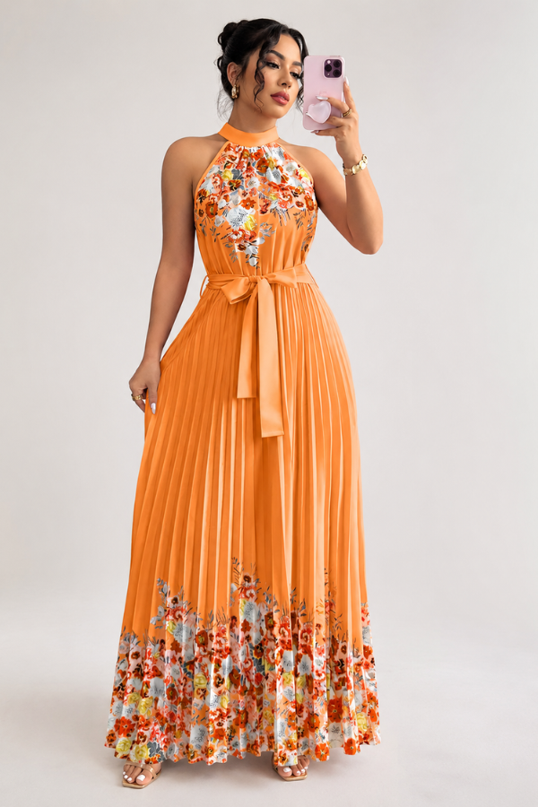Flowy pleated skirt of an elegant floral midi dress for women, offering comfort and stylish movement.