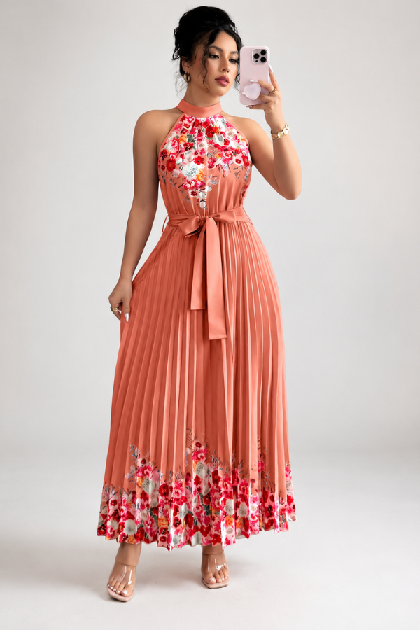 Women's elegant floral pleated midi dress with a square neck, studio shot on a hanger, front view.
