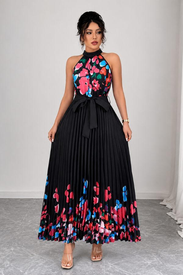 Feminine fashion: elegant floral pleated midi dress with a chic square neck, offering graceful style.