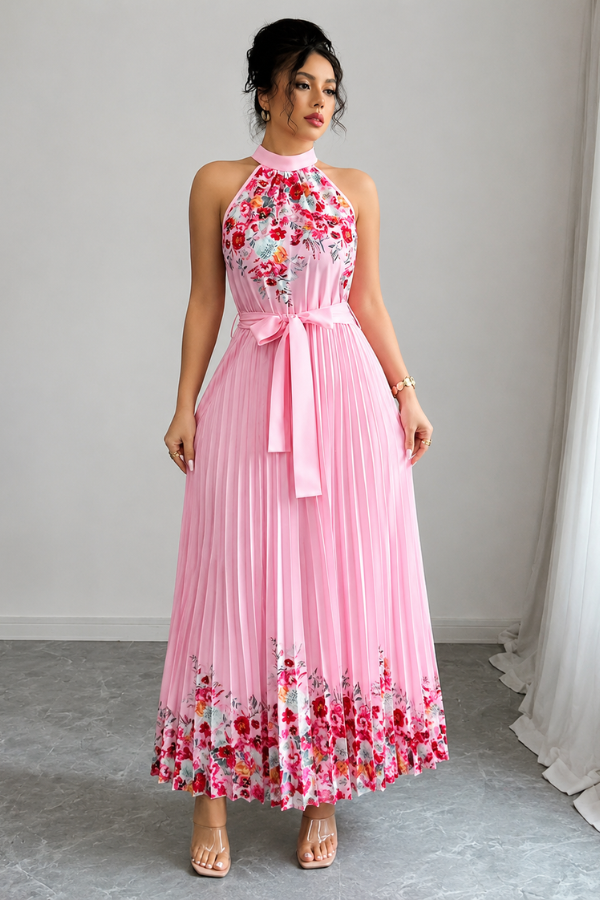 Vibrant floral print and delicate pleats on a women's midi dress, ideal for vacation and parties.