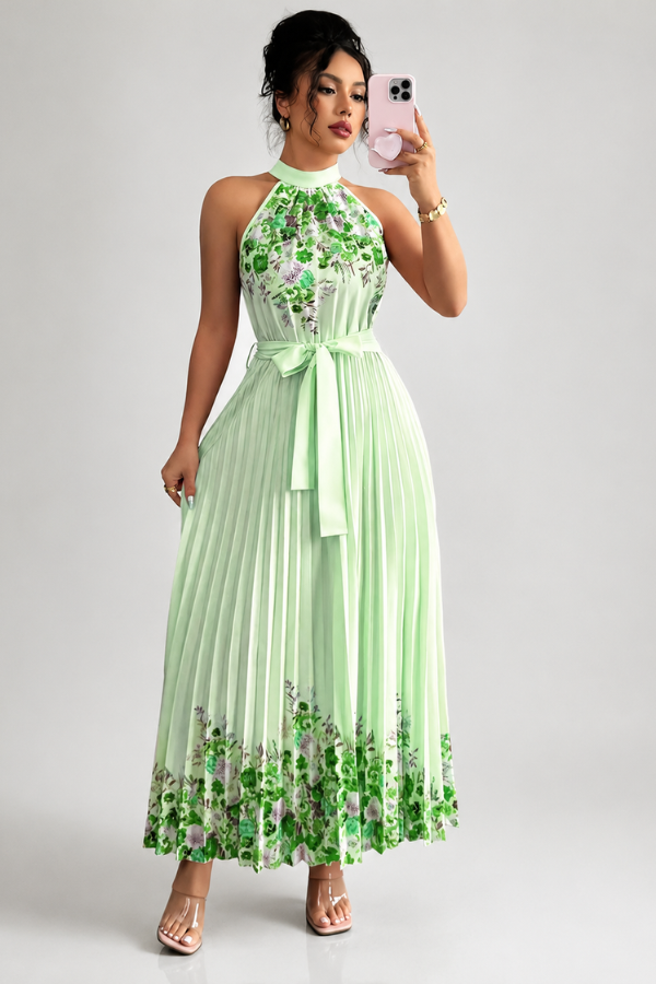 Back view of an elegant women's floral midi dress, featuring a flattering fit and pleated design.