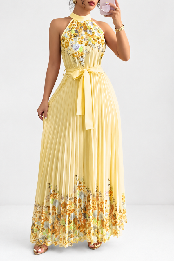 Model sitting in an elegant floral square neck midi dress, perfect for relaxed feminine fashion.