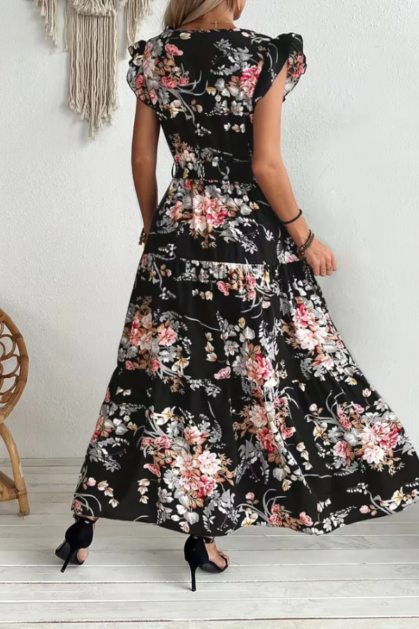 Beautiful women's floral print maxi dress with a flattering belt. V-neck swing dress, ideal elegant summer vacation wear.