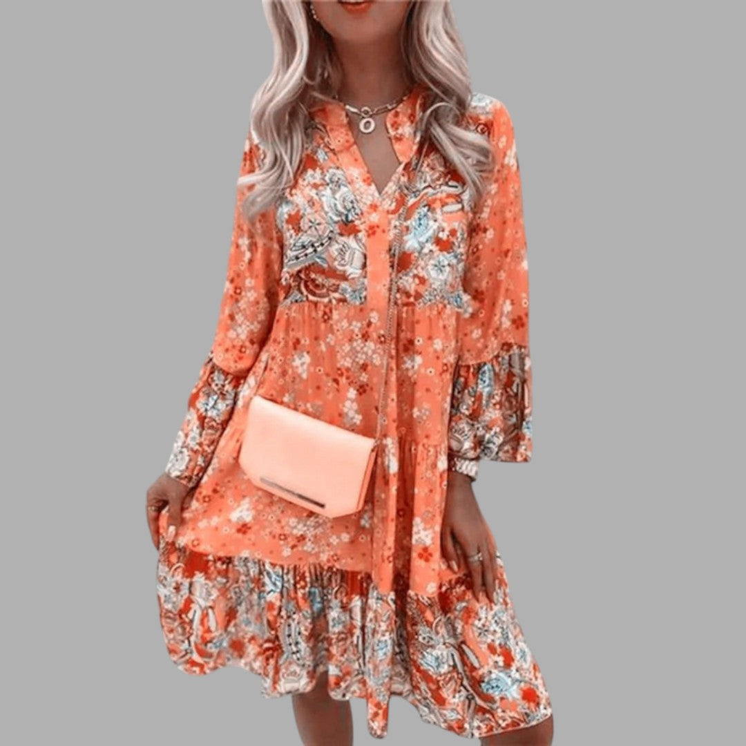 Charming women's elegant floral midi dress. Versatile spring/summer fashion, suitable for semi-formal and party wear.