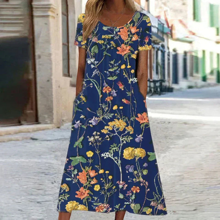 Elegant women's floral print midi dress with short sleeves, perfect for summer casual wear or vacation.