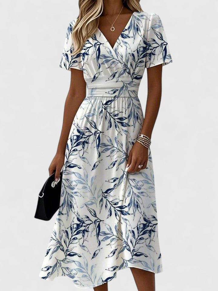 Elegant women's floral print midi dress with wrap V-neck & flutter sleeves, perfect for spring/summer parties & brunch.
