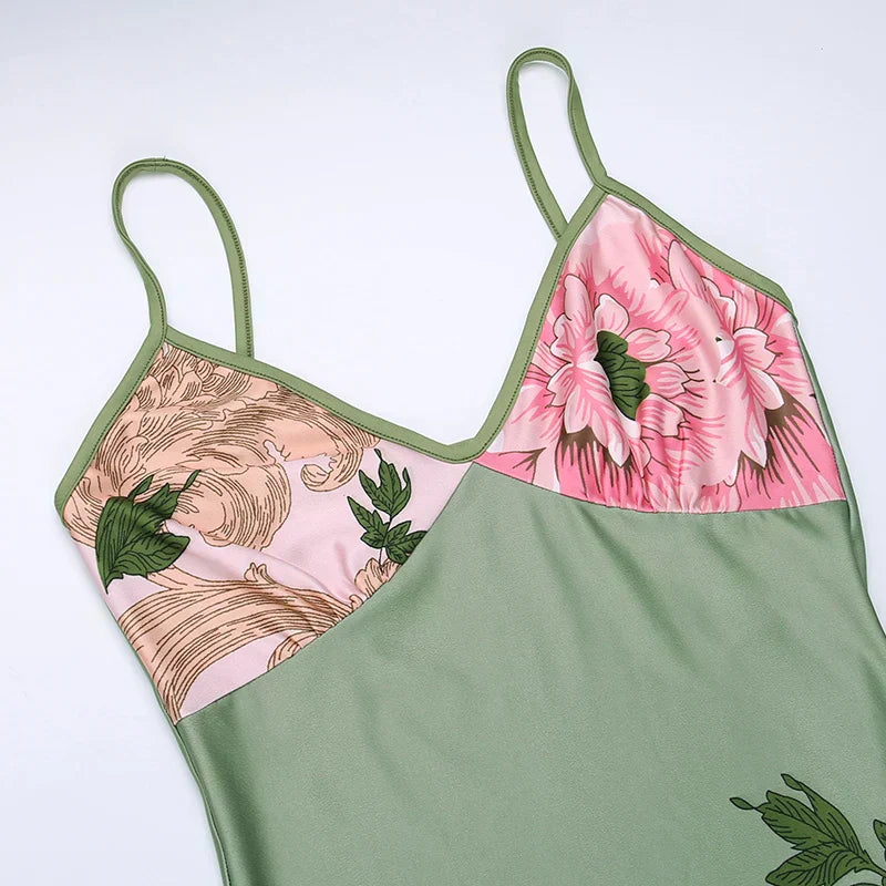 Vibrant floral summer maxi dress for women, designed with spaghetti straps and a chic V-neck for elegance.