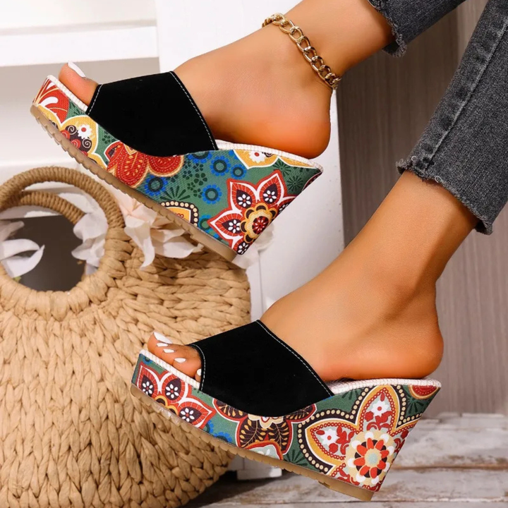 Fashionable women's floral print slip-on wedge sandals, comfortable and chic for summer.