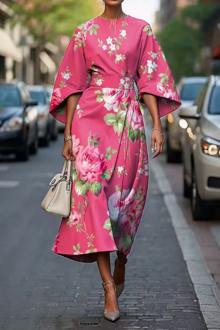 Feminine women's floral summer dress featuring an elegant design & comfortable, flowy fabric for any event.